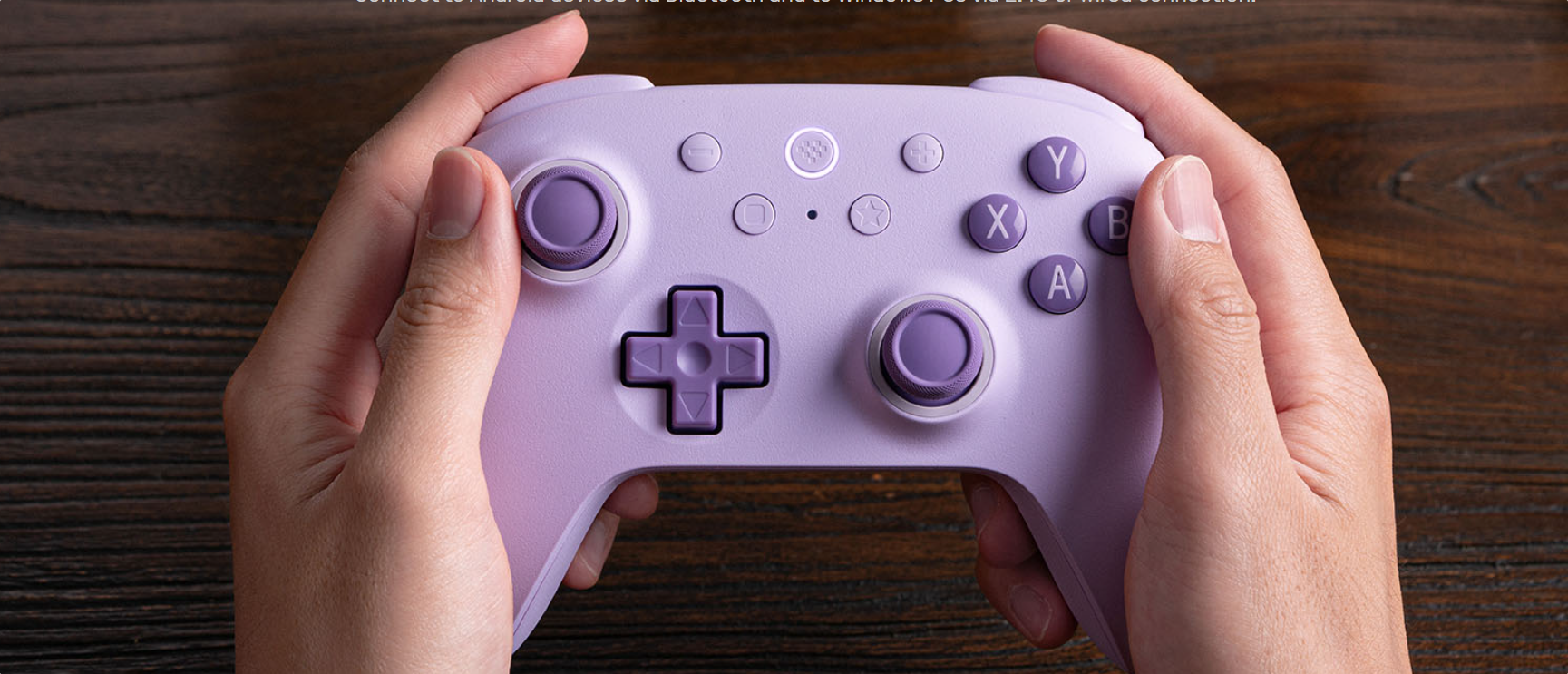 8BitDo Ultimate 2C wireless controller for PC gaming with Xbox-style button layout.
