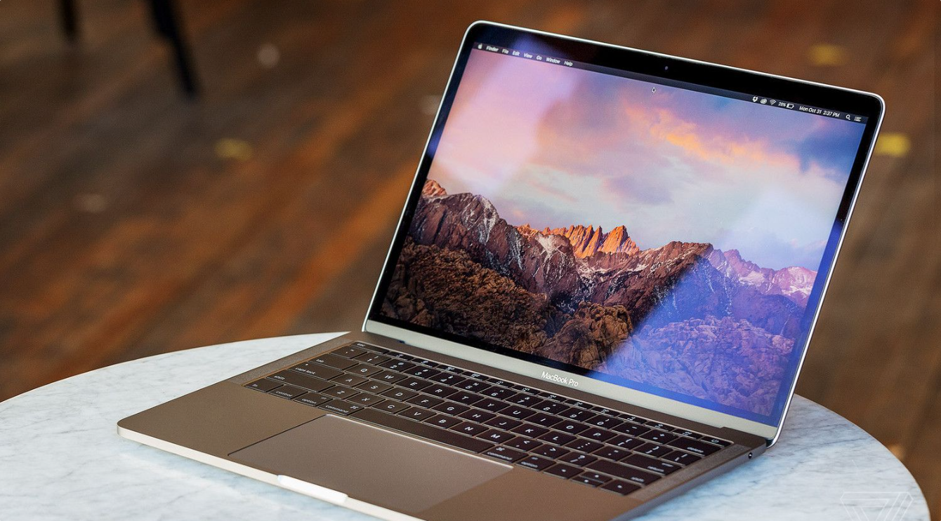 Apple MacBook Pro 14-inch with a 3024 × 1964 Liquid Retina XDR display, up to 120Hz ProMotion refresh rate, and wide P3 color support.